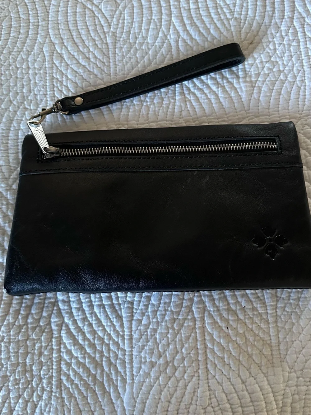 Patricia Nash Black Leather clutches with Embossed Clover Motif